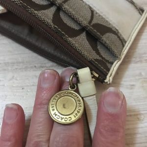 Coach coin purse. Signs of light wear.